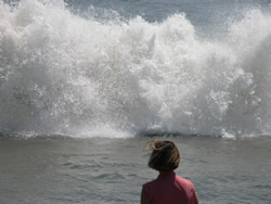 Woman looking at wave